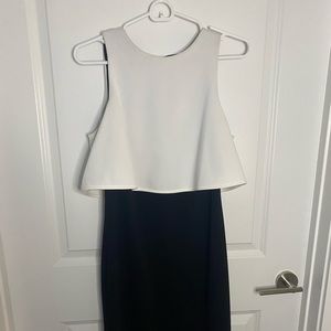 Black and white Calvin Klein semi-open back dress.